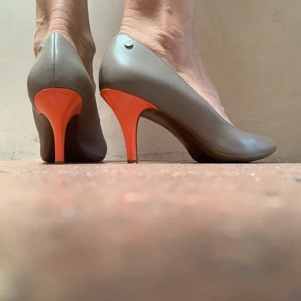 Calvin Klein Leather fashion shoe with stylish orange heel